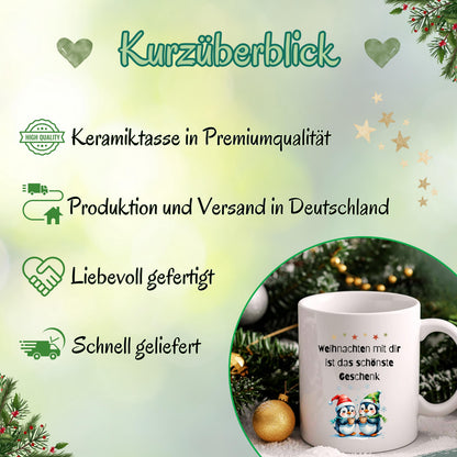 Weihnachtstasse mit Spruch „Weihnachten mit dir ist das schönste Geschenk“ als originelle Geschenkidee für Freundin, Partnerin, Kollegin oder Ehefrau. Die Kaffeetasse zeigt zwei niedliche Pinguine mit Weihnachtsmütze, die Kakao halten – perfekt für Winter, Advent und Weihnachtszeit. Lustige Tasse Weihnachten für Paare, Familien, Büro oder Zuhause. Hochwertiger Keramikbecher, ideal als kleines Geschenk, Wichtelgeschenk oder Weihnachtsgeschenk für Frauen, Pinguin-Fans, Kollegen, Kaffeeliebhaber.