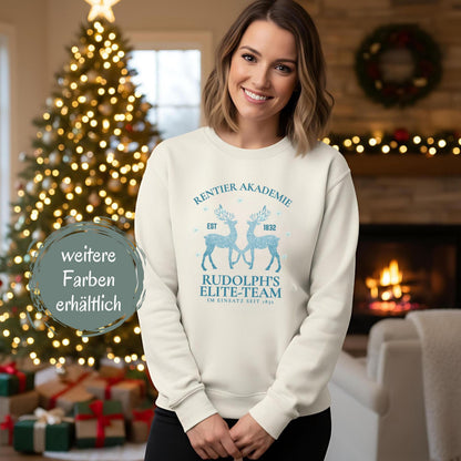 Weihnachtspullover „Rentier Akademie – Rudolph’s Elite-Team“ für Damen & Herren mit humorvollem Rentier-Motiv und Schneeflocken. Perfekter Winterpullover als Geschenkidee für Frauen und Männer, ideal für Nikolaus, Weihnachtsmarkt, Advent & Weihnachtsfeier. Witziges Weihnachtsoutfit mit Rentieren, festlich & gemütlich – ein weihnachtliches Statement-Stück für Familie, Partnerlook, Wichtelrunden oder den festlichen Abend. Für Fans von Rudolph, Rentiere & Christmas Spirit!