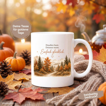 Herbst Tasse mit Spruch als Geschenk für beste Freundin und Geschenk für Kaffeeliebhaber. Weiße Keramiktasse 330 ml mit „Draußen bunt. Drinnen warm. Einfach glücklich.“ Herbsttasse mit Wald und Bergen für Herbstzeit und Cozy Season. Kaffeeliebhaber Geschenk, Herbst Geschenk für Freundin, Mama oder Schwester sowie Me Time Geschenk und Selfcare Geschenk. Keramiktasse und Tasse Herbst für Kaffee, Tee und gemütliche Herbstmomente, Produktion und Versand aus Deutschland.